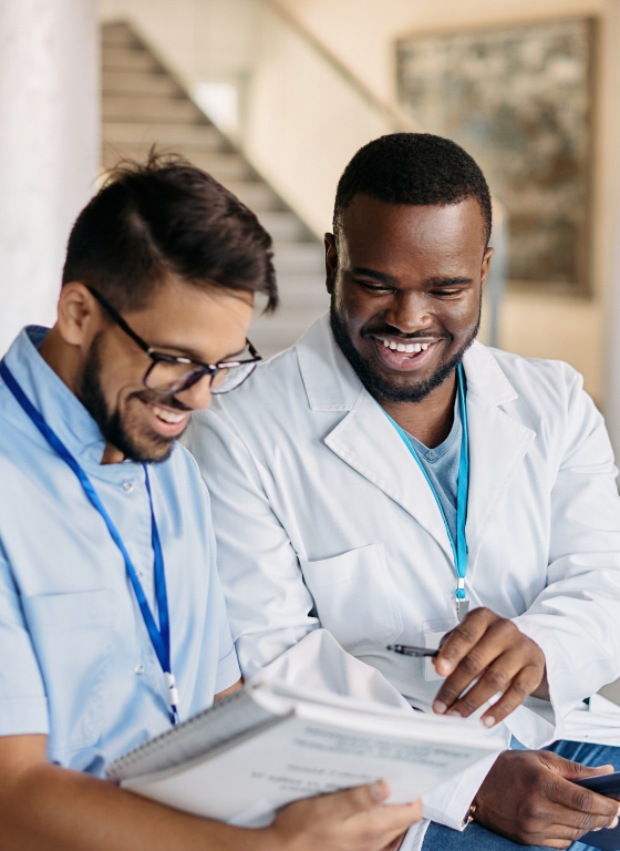 Two medical students reading.