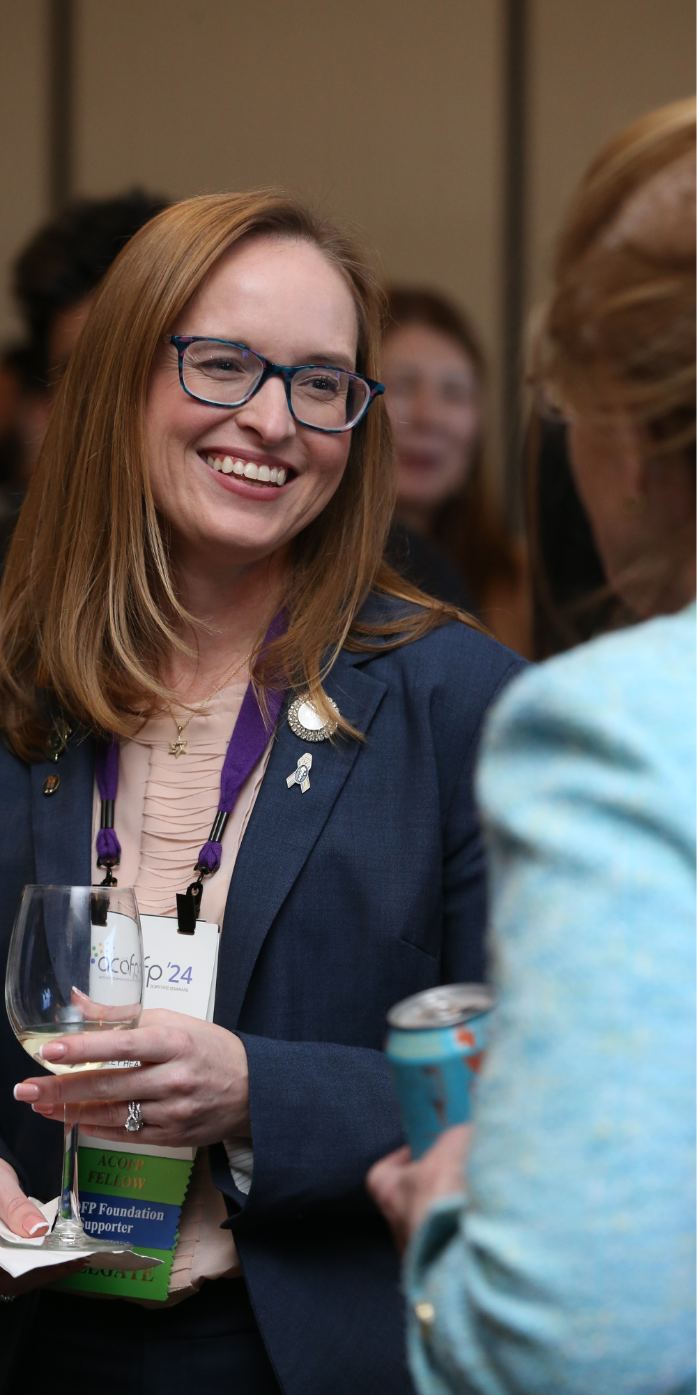 Woman Smiling at Networking Event