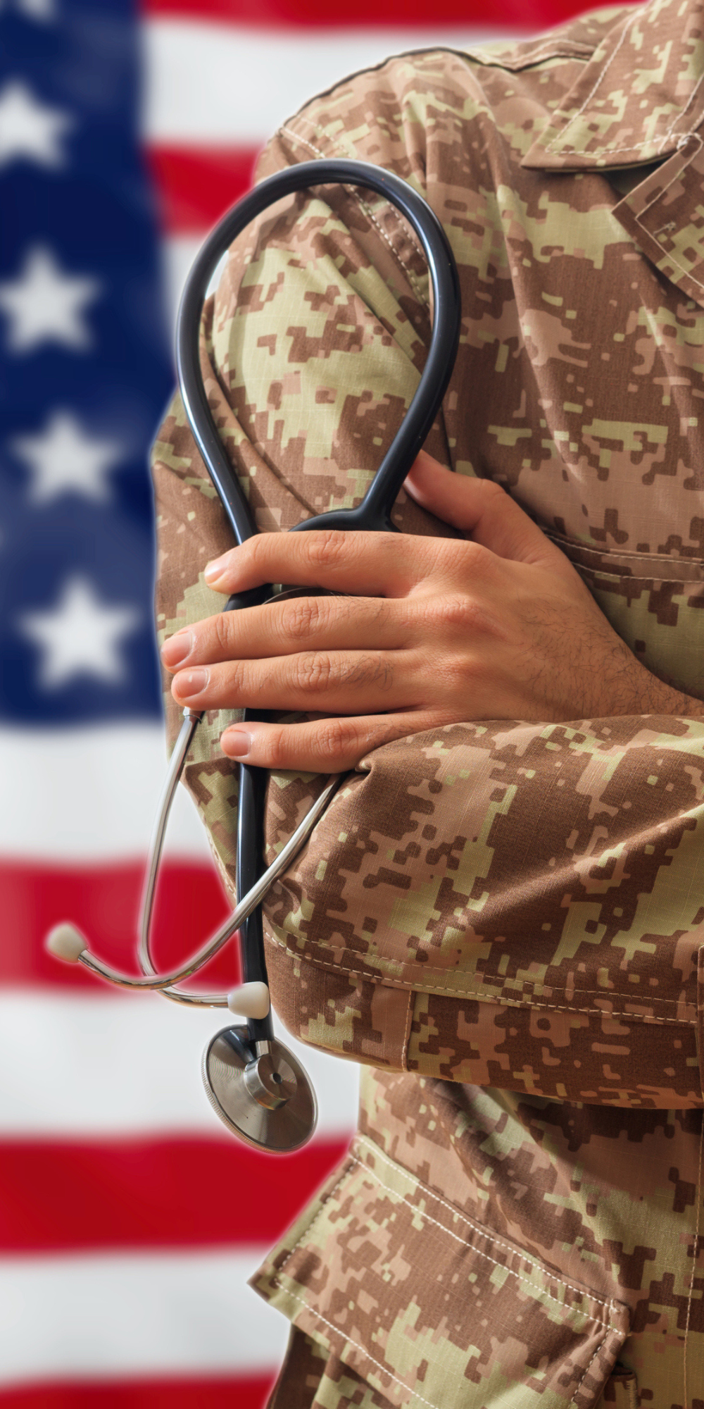 Military Member Holding Stethoscope