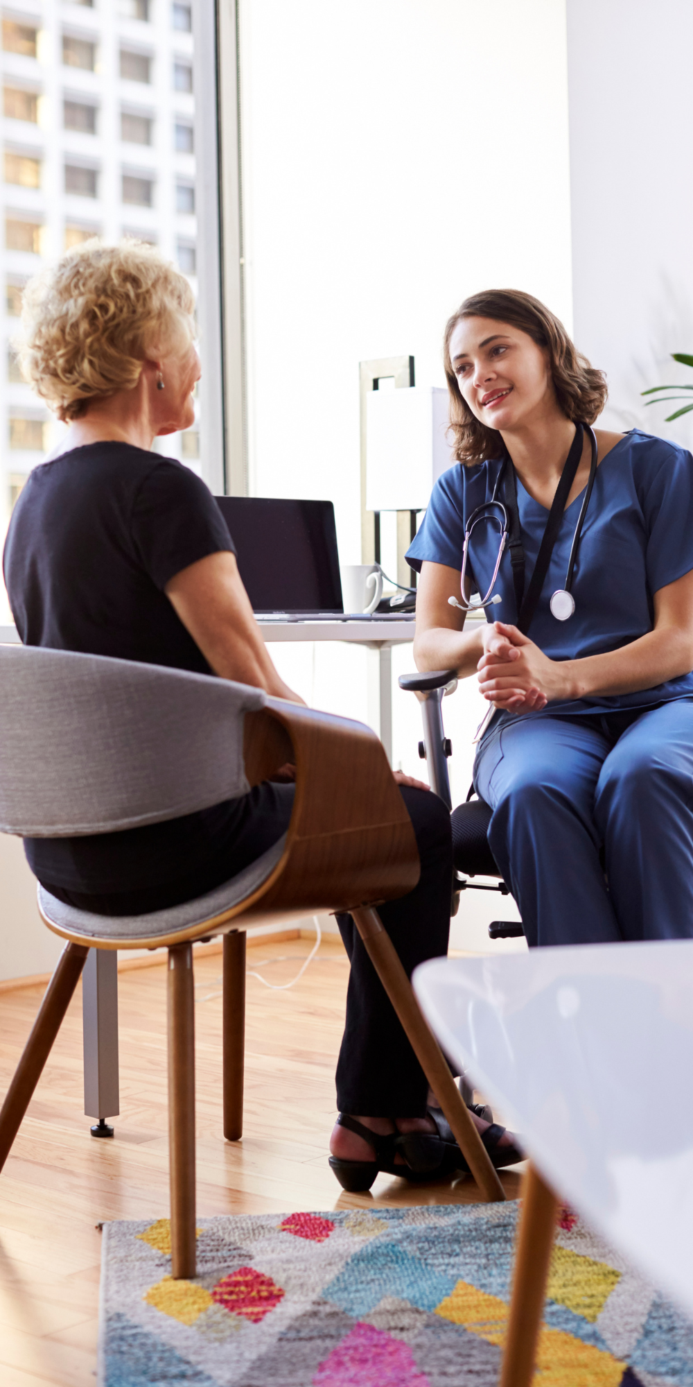 Doctor consulting with patient