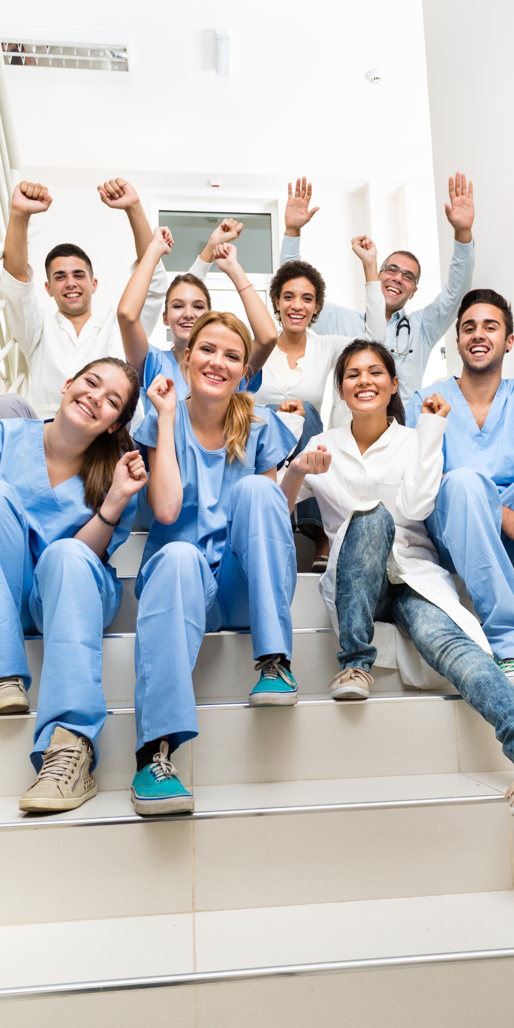 Happy group of students in scrubs